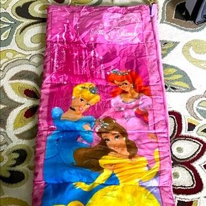 Disney sleeping bed with sleeping bag.